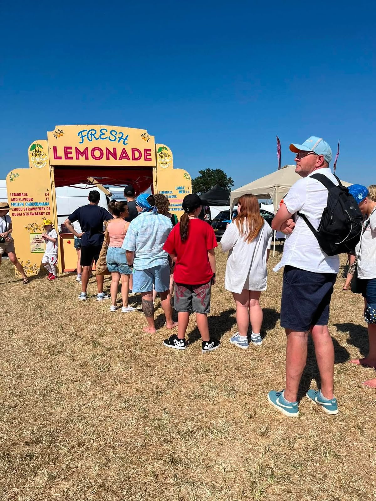Naughty Fruit stall with queue